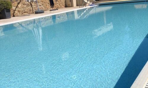 outdoor pool with white pearl mosaic tiles